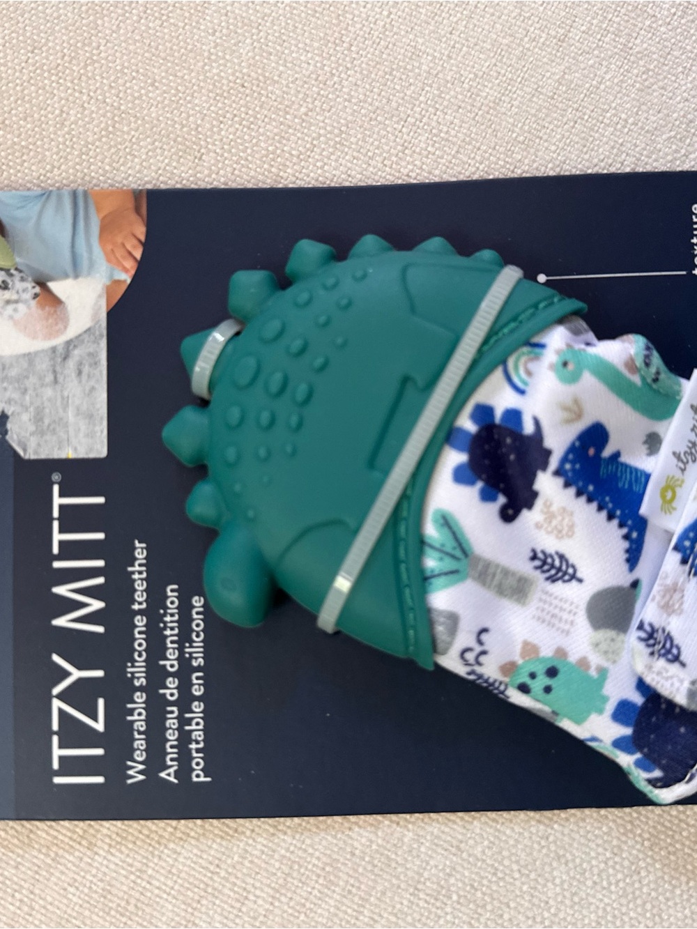 Itzy Ritzy Teething Mitt in Teal with Dino Print